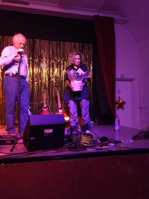 Amy Wadge and Andrew Grogono (our late Chairman who started the Entertainment evenings )